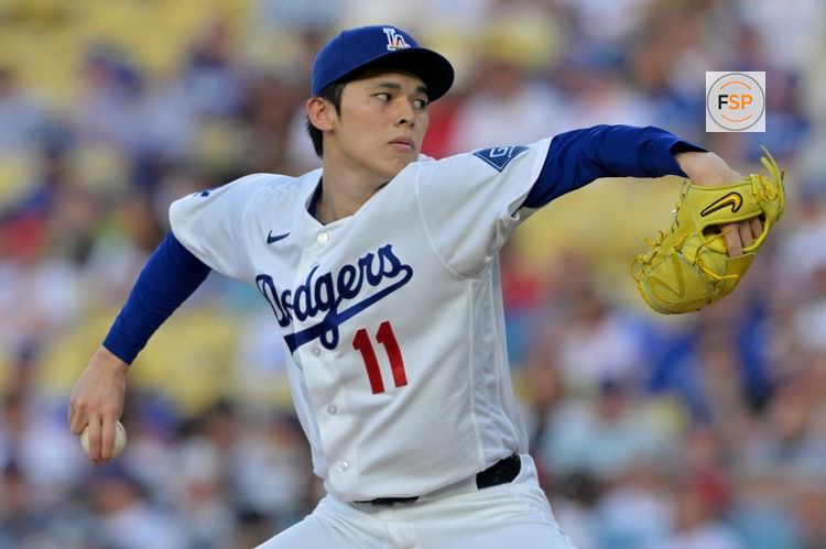 Jun 5, 2026; Los Angeles, California, USA;  Los Angeles Dodgers starting pitcher Roki Sasaki (11) delivers to the plate in the first inning against the Los Angeles Angels at Dodger Stadium. Credit: Jayne Kamin-Oncea-Imagn Images