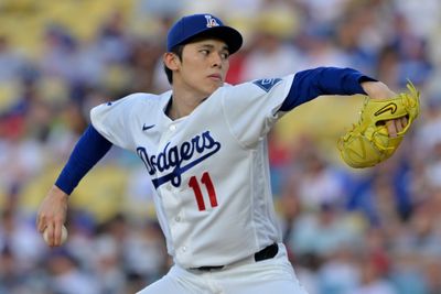 Jun 5, 2026; Los Angeles, California, USA;  Los Angeles Dodgers starting pitcher Roki Sasaki (11) delivers to the plate in the first inning against the Los Angeles Angels at Dodger Stadium. Mandatory Credit: Jayne Kamin-Oncea-Imagn Images