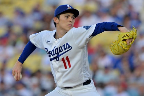 Jun 5, 2026; Los Angeles, California, USA;  Los Angeles Dodgers starting pitcher Roki Sasaki (11) delivers to the plate in the first inning against the Los Angeles Angels at Dodger Stadium. Mandatory Credit: Jayne Kamin-Oncea-Imagn Images