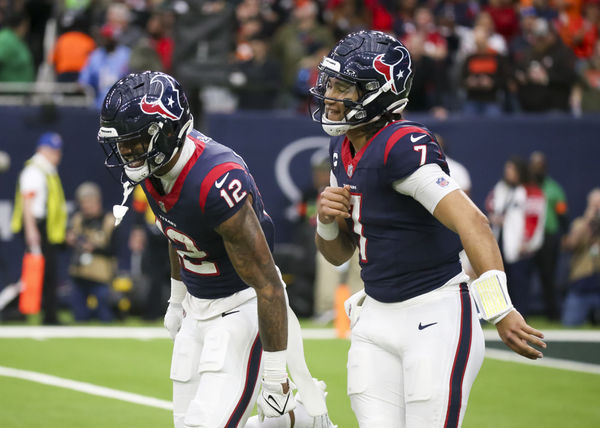 HOUSTON, TX - JANUARY 13:  Houston Texans quarterback C.J. Stroud (7) celebrates with Houston Texans wide receiver Nico Collins (12) on his touchdown in the first quarter during the AFC Wild Card game between the Cleveland Browns and Houston Texans on January 13, 2024 at NRG Stadium in Houston, Texas.  (Photo by Leslie Plaza Johnson/Icon Sportswire)