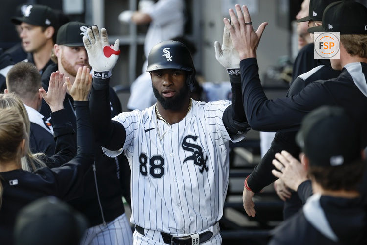 Apr 29, 2025; Chicago, Illinois, USA; Chicago White Sox center fielder Luis Robert Jr. (88) celebrates with teammates after hitting a solo home run against the Milwaukee Brewers during the first inning at Rate Field. Credit: Kamil Krzaczynski-Imagn Images