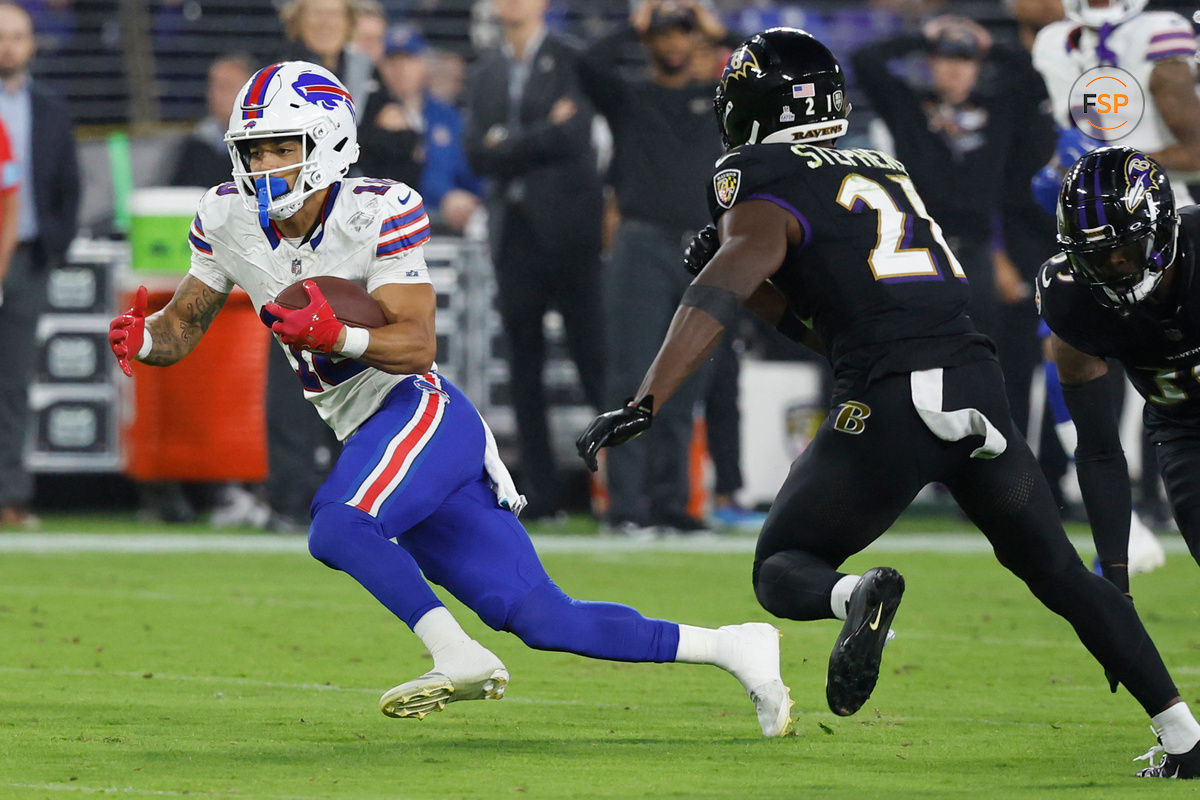 Sep 29, 2024; Baltimore, Maryland, USA; Buffalo Bills wide receiver Khalil Shakir (10) runs with the ball after making a catch as Baltimore Ravens cornerback Brandon Stephens (21) chases at M&T Bank Stadium. Credit: Geoff Burke-Imagn Images