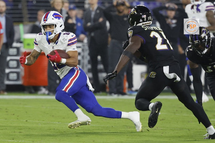 Sep 29, 2024; Baltimore, Maryland, USA; Buffalo Bills wide receiver Khalil Shakir (10) runs with the ball after making a catch as Baltimore Ravens cornerback Brandon Stephens (21) chases at M&T Bank Stadium. Credit: Geoff Burke-Imagn Images