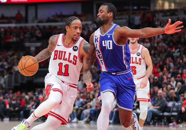 CHICAGO, IL - FEBRUARY 03: Harrison Barnes #40 of the Sacramento Kings guards DeMar DeRozan #11 of the Chicago Bulls during the second half at the United Center on February 3, 2024 in Chicago, Illinois. (Photo by Melissa Tamez/Icon Sportswire)