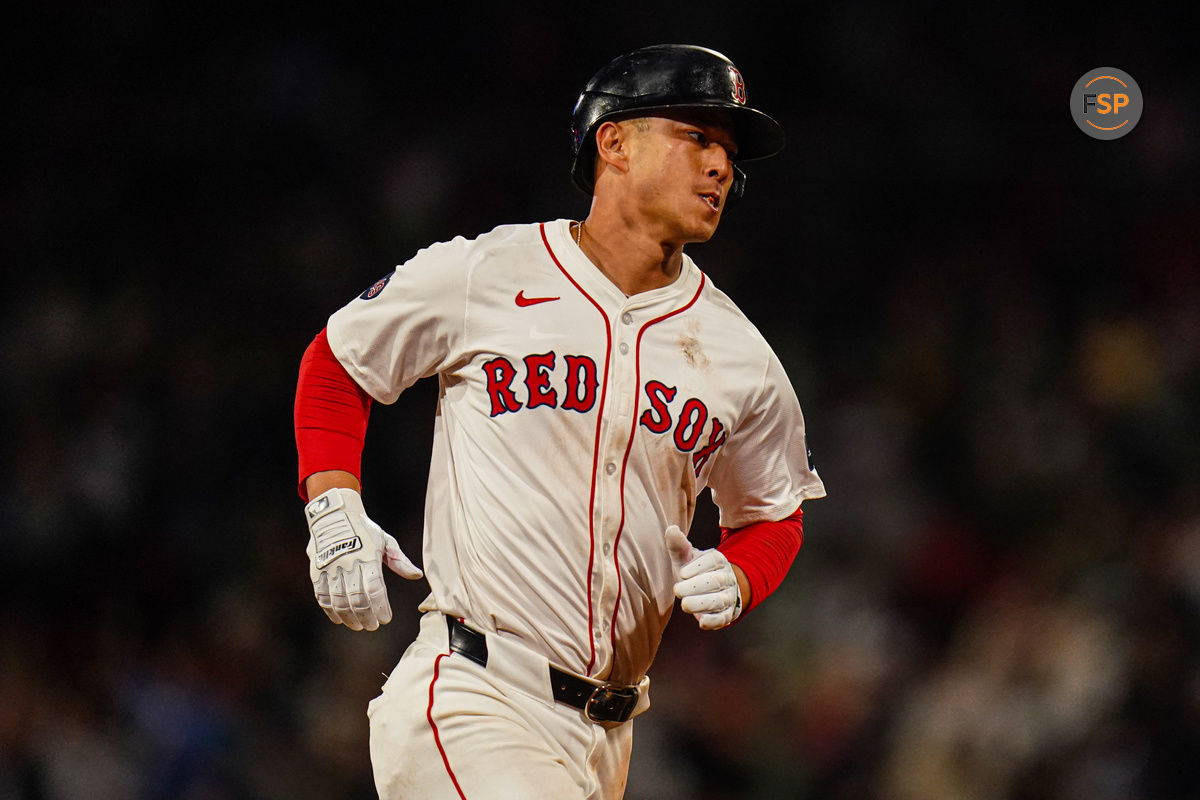 Sep 9, 2024; Boston, Massachusetts, USA; Boston Red Sox right fielder Rob Refsnyder (30) hits a home run against the Baltimore Orioles in the eighth inning at Fenway Park. Credit: David Butler II-Imagn Images