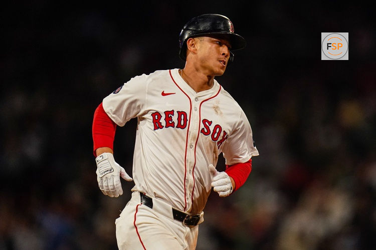 Sep 9, 2024; Boston, Massachusetts, USA; Boston Red Sox right fielder Rob Refsnyder (30) hits a home run against the Baltimore Orioles in the eighth inning at Fenway Park. Credit: David Butler II-Imagn Images