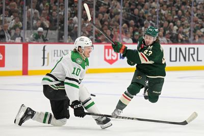 Apr 30, 2026; Saint Paul, Minnesota, USA; Dallas Stars forward Oskar Back (10) blocks the shot attempt of Minnesota Wild defensemen Quinn Hughes (43) during the second period in game six of the first round of the 2026 Stanley Cup Playoffs at Grand Casino Arena. Mandatory Credit: Nick Wosika-Imagn Images